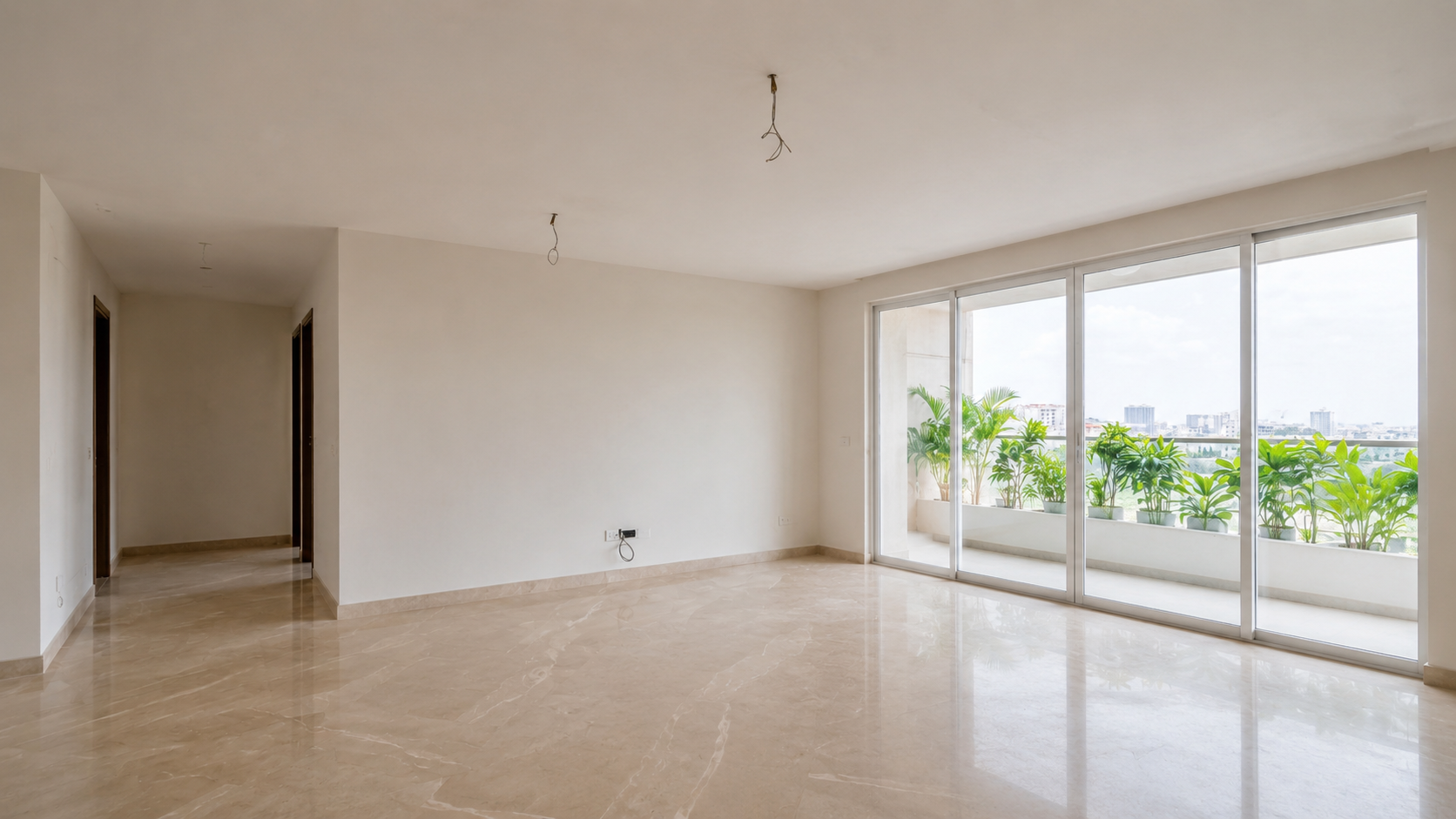 Same room before renovation with bare concrete ceiling